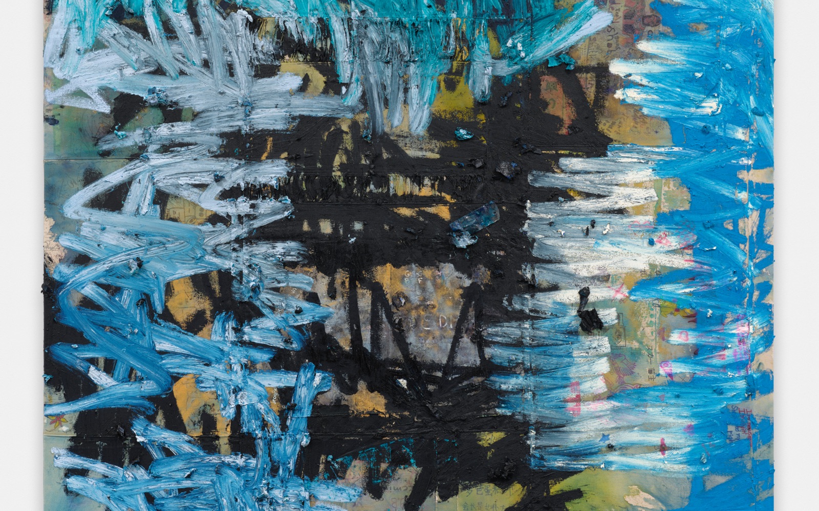 Detail of a densely layered painting by Oscar Murillo, with heavy strokes of blue and white over black and collaged surfaces.